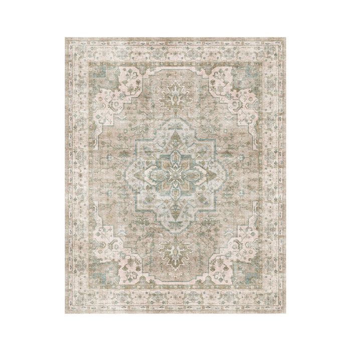The Manisa Washable Rug 240x300cm features a rectangular Persian-inspired design with a faded floral and geometric pattern in beige, cream, and blue-green. Made from durable, machine-washable polyester for easy care.