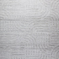 The Tufted Teal Jules Rug 300x240cm features a subtle geometric pattern of curved and straight lines, arranged symmetrically in a Mid-Century inspired design. The textured surface adds visual interest to any space.