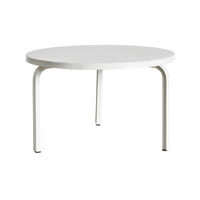 The Kace Outdoor Coffee Table in white features a round design with four slender legs, crafted from powder-coated galvanized steel.