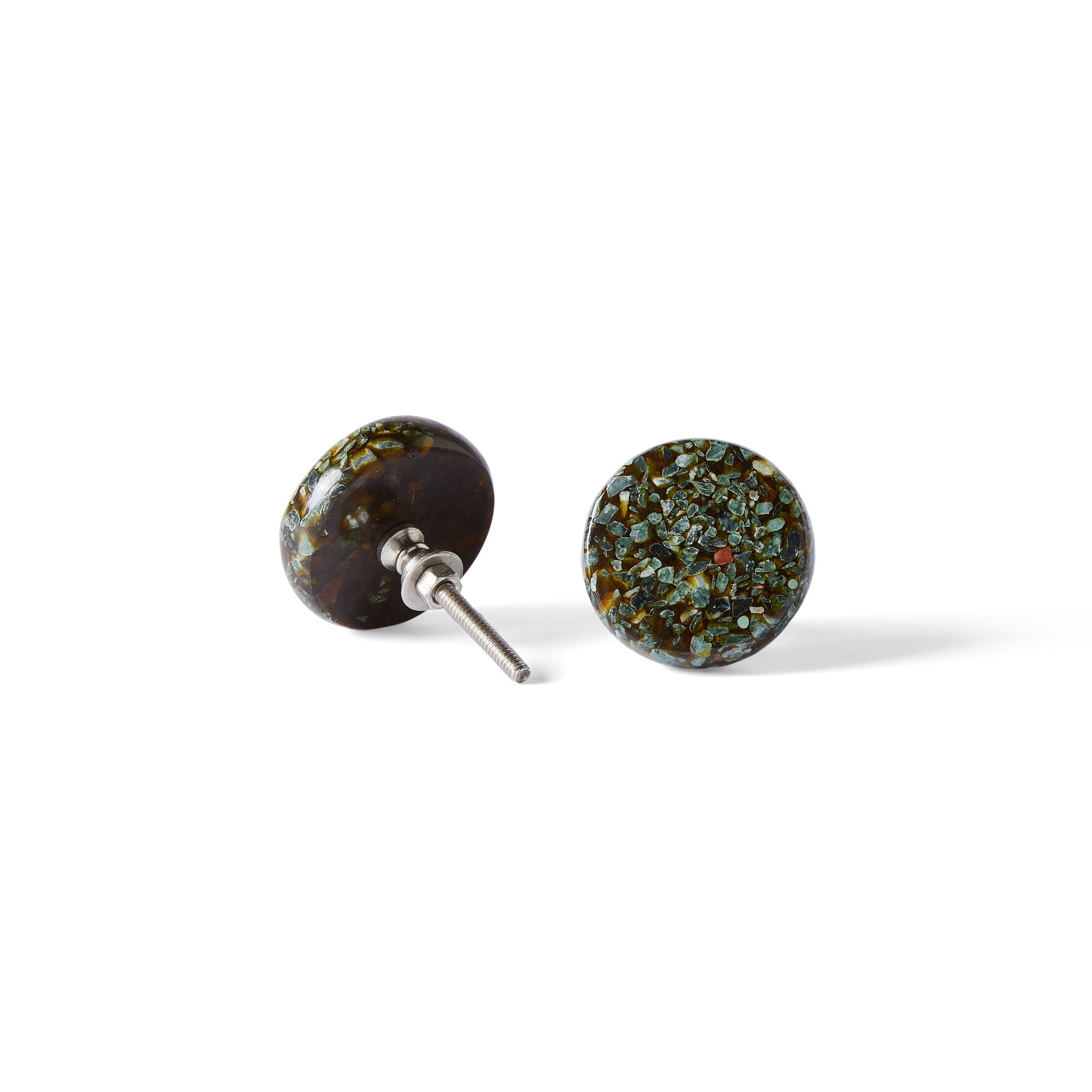 A pair of round stud earrings inspired by the Speckle Emerald Knob 4.5cm, featuring dark, speckled surfaces and sleek silver posts, shown on a white background.
