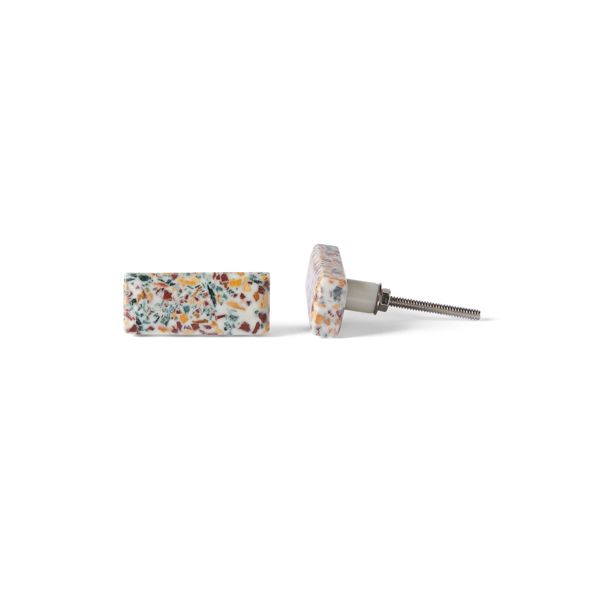 Refresh your cabinets with two Speckle Terrazzo Knob Small 5.4cm—rectangular knobs featuring a multicolor speckled pattern on white, terrazzo style, and visible screw attachments for a modern look.