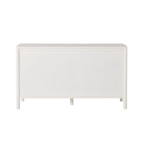 The Spintara 6 Drawer Low Chest White features a minimalist, rectangular design with flat front panels and four straight legs—perfect as a sleek white bedroom chest or modern storage solution for contemporary spaces.