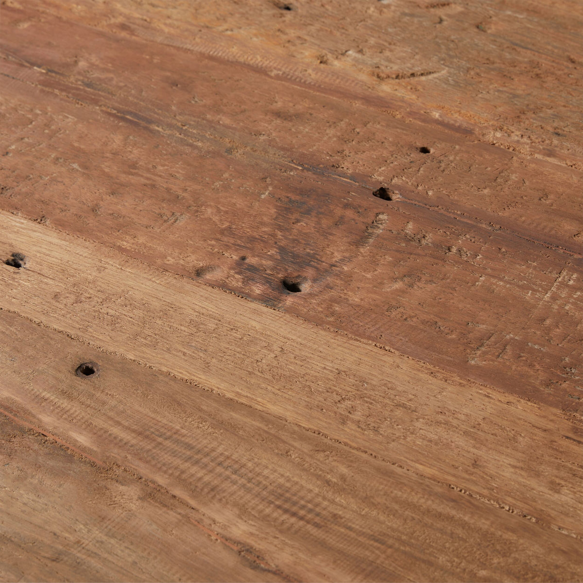 Close-up of the Barndo Reclaimed Dining Table 240x100cm, highlighting its weathered wooden surface with visible grain, knots, and aging signs.