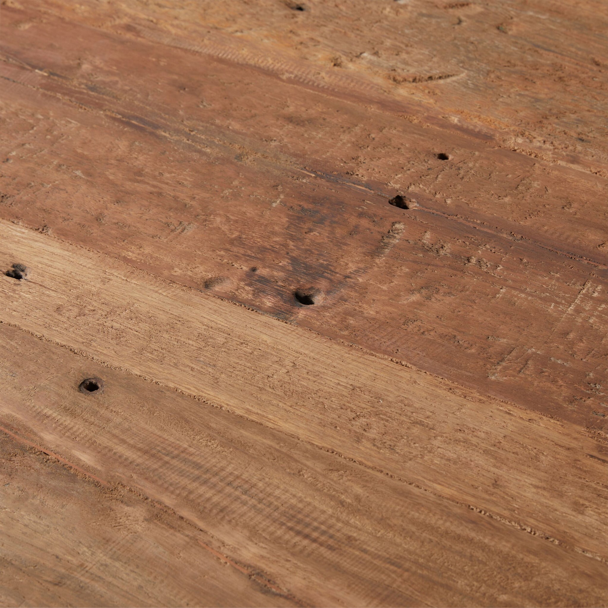 Close-up of the Barndo Reclaimed Dining Table 240x100cm, highlighting its weathered wooden surface with visible grain, knots, and aging signs.
