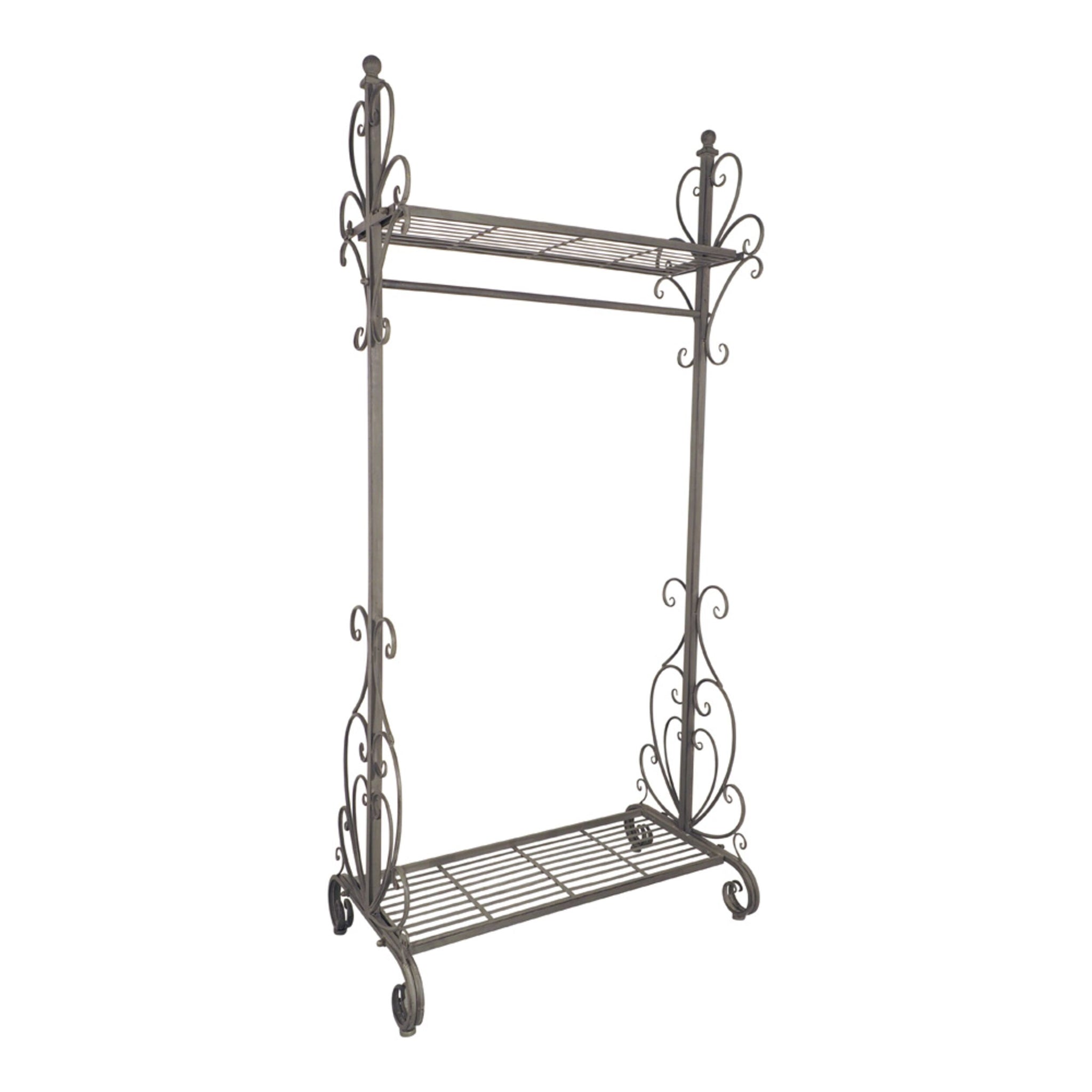 The Arlette Coat Rack Rail is an elegant unit with two open iron shelves and ornate scrollwork on the sides, finished in antique silver.