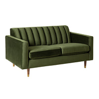 The Stitch 2 Seater Velvet Sofa in Juniper Olive features vertical channel tufting, square arms, and brass-capped legs—a modern mid-century statement piece shown against a white background.