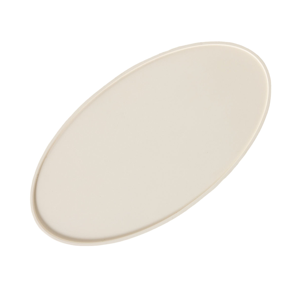 A plain, oval-shaped, off-white ceramic plate is displayed on a white background, evoking the smooth elegance of the Lani Oval Coffee Table White Wash (120 x 39 x 65cm).