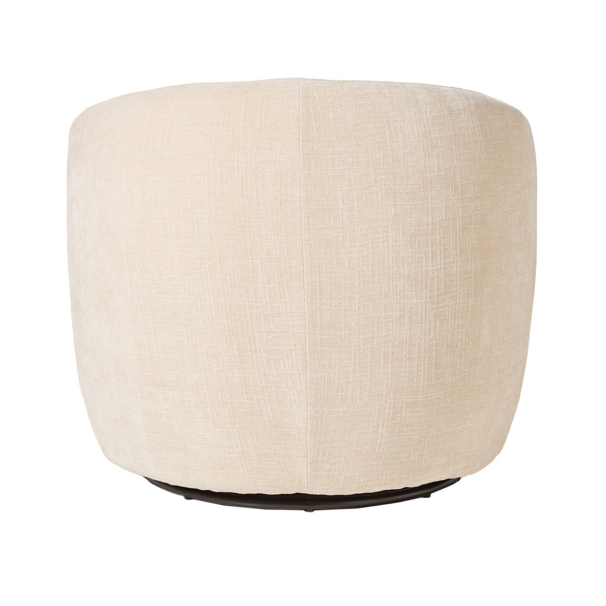 A beige, round upholstered ottoman with a black base perfectly enhances home decor, adding a stylish touch that complements the Alessa Swivel Armchair Oasis Dune beautifully.