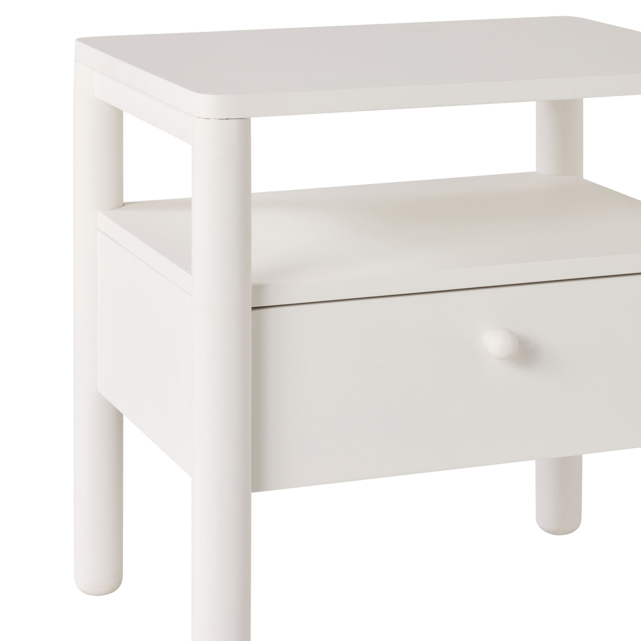 The Spintara 1 Drawer Bedside Table White features a single drawer with a round knob, rounded legs, and an open shelf—ideal for bringing coastal country style charm to your bedroom.