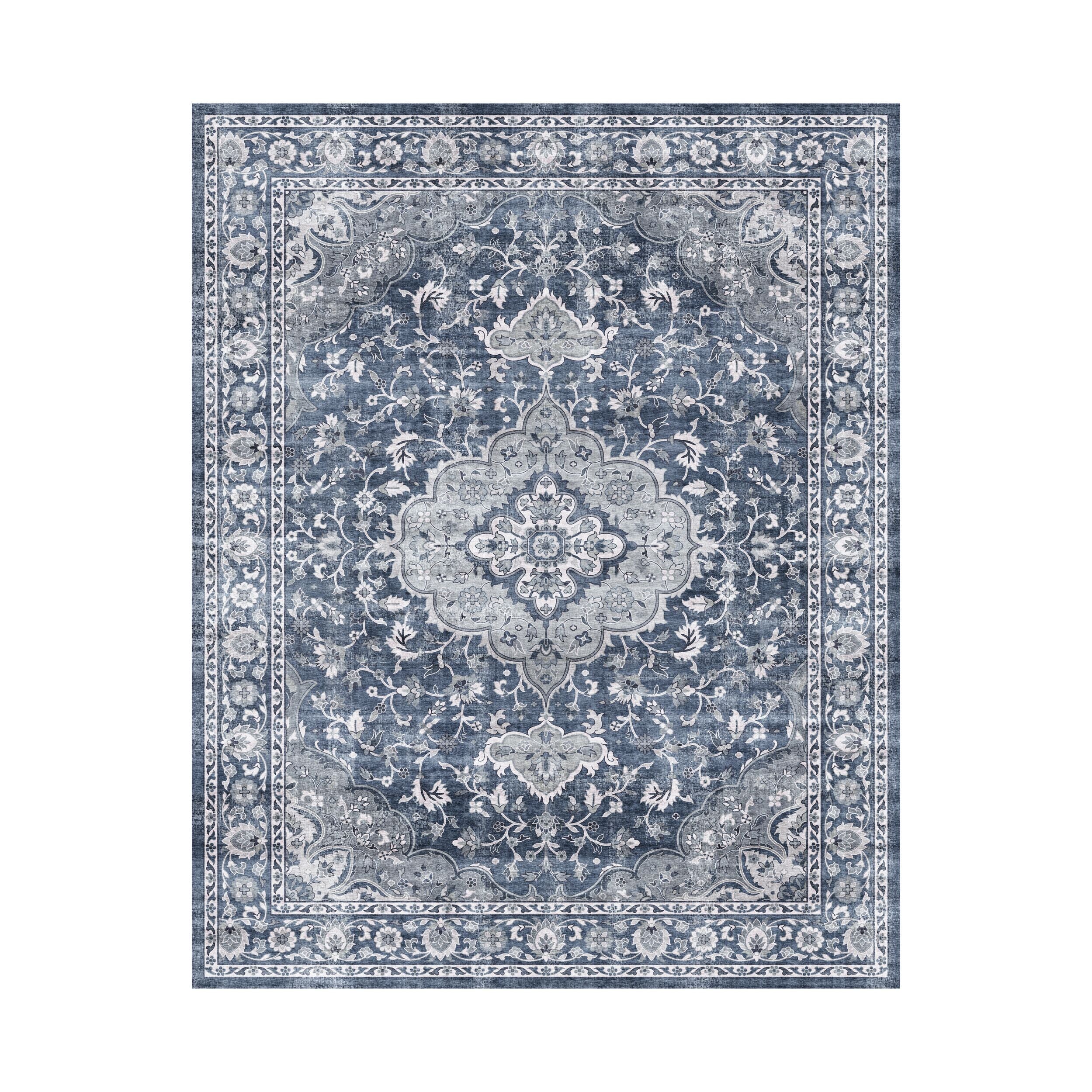 The Manisa Washable Rug 240x300cm features a rectangular Persian-inspired design with a faded floral and geometric pattern in beige, cream, and blue-green. Made from durable, machine-washable polyester for easy care.