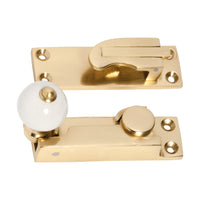 1604 Sash Fastener Porcelain Ball Polished Brass L73xW26mm