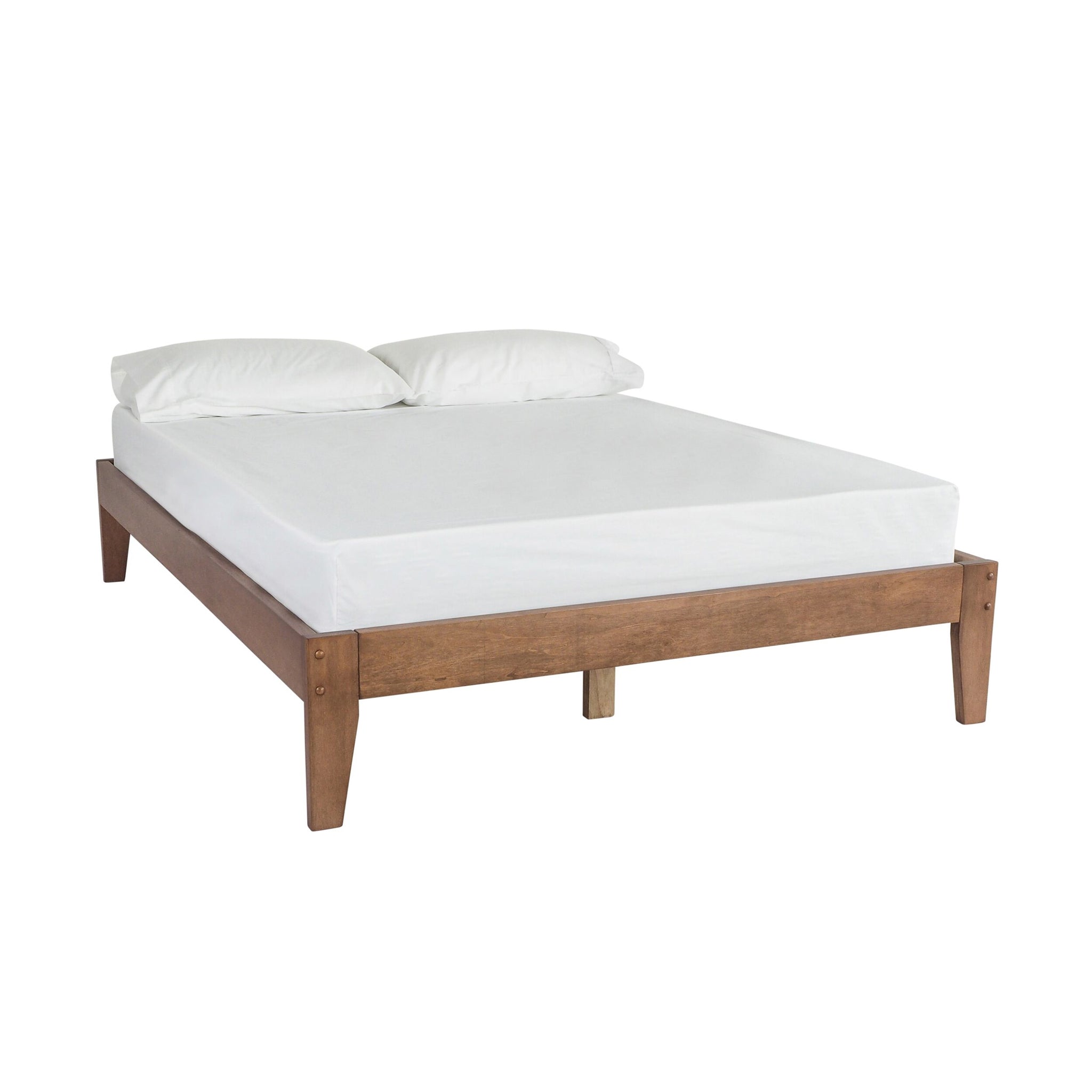The Kyan Double Bed Base Chestnut, featuring a chestnut finish wooden frame, is elegantly set against a plain background with a white mattress and two pillows, offering both style and comfort.