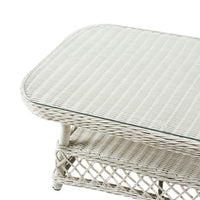 Rectangular white wicker table with glass top and woven lower shelf pairs perfectly with the Catalina 4 Pce Sofa Set, made from all-weather wicker for style and durability in any patio setting.