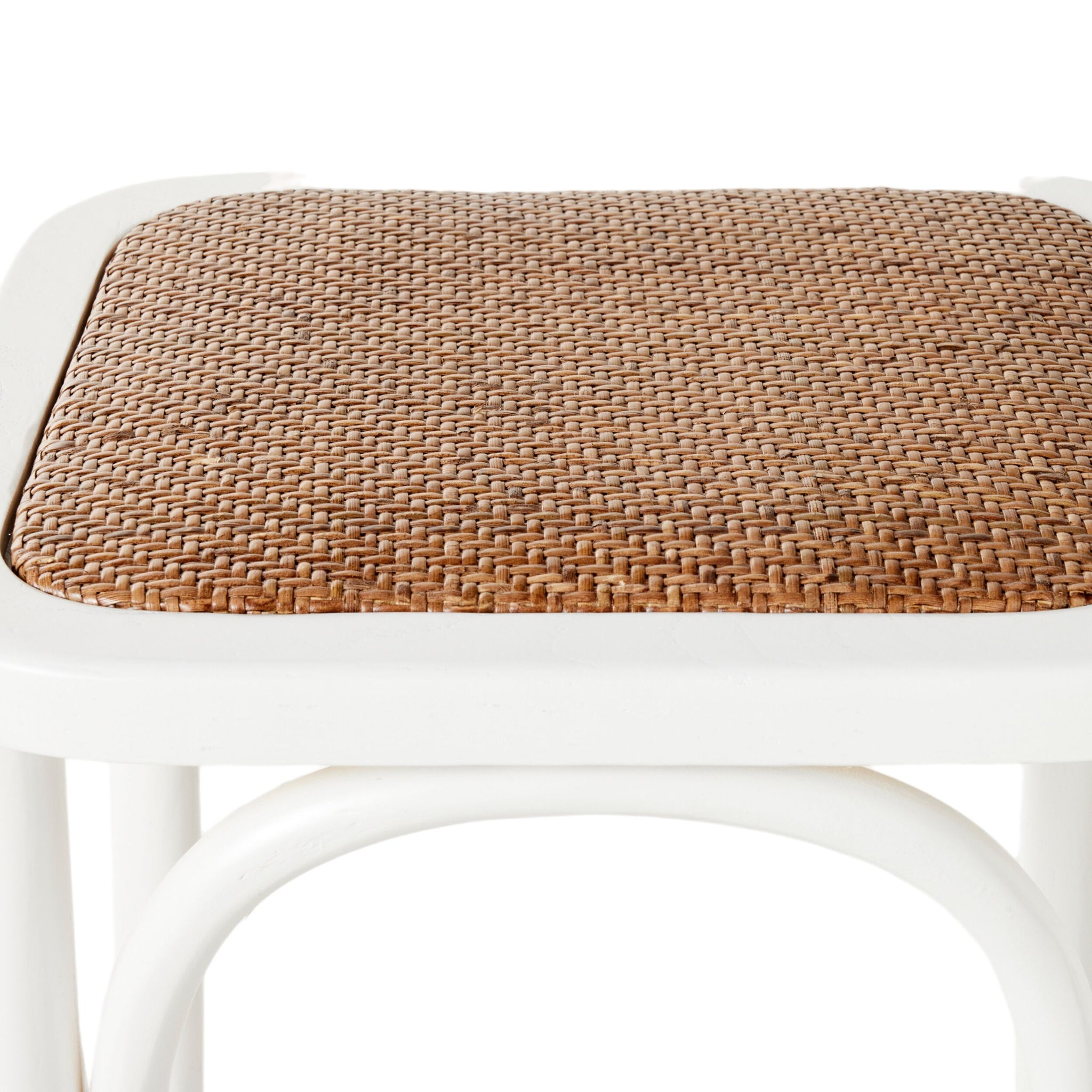 Close-up of the Bastion Backless Bar Stool White featuring a square woven rattan seat and a white elm wood frame, ideal for bringing coastal style charm to your space.