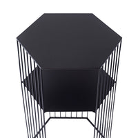 The Hendrix Bedside Table is a contemporary piece made from black powder-coated iron, featuring a minimalist hexagonal shape with thin vertical slats.