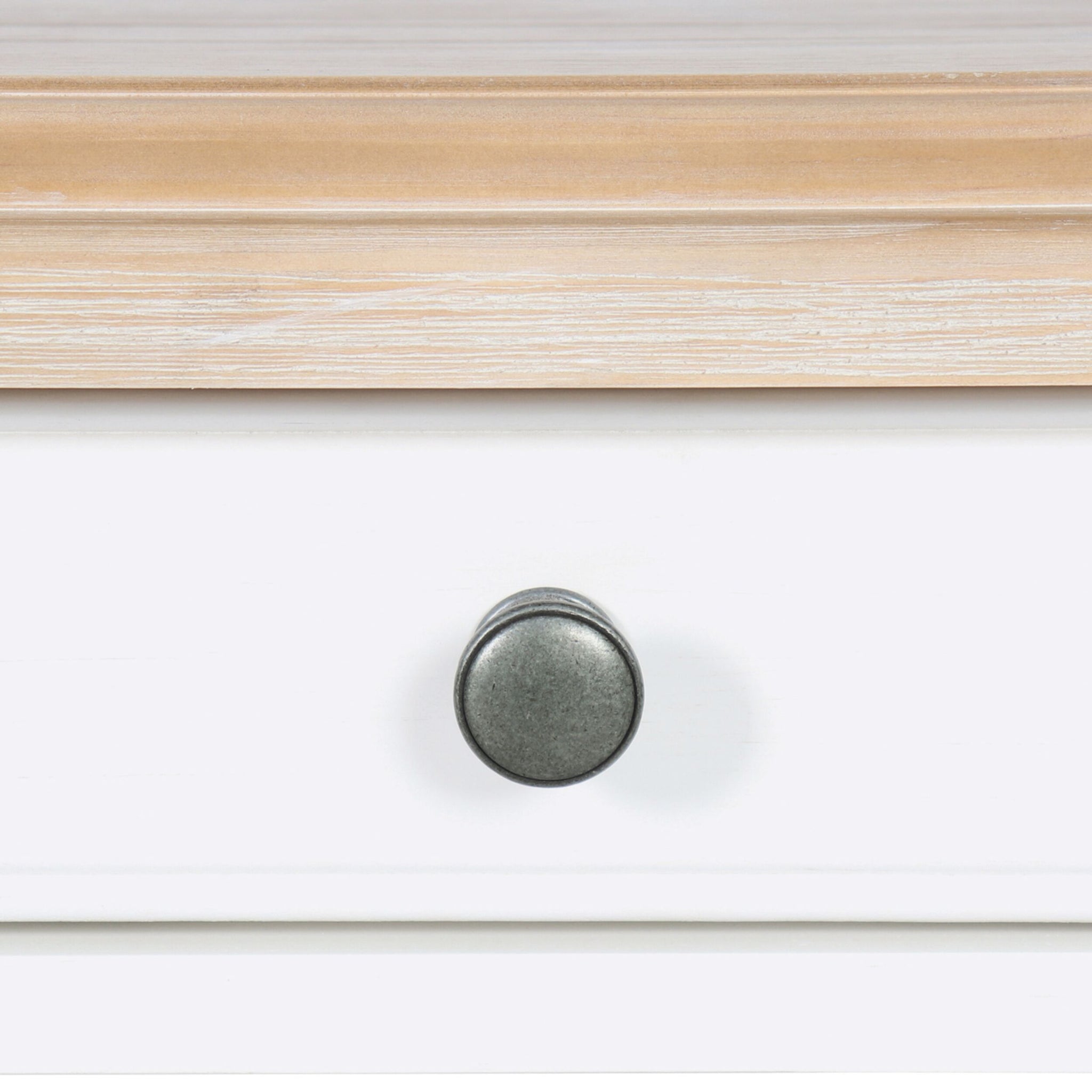 Close-up of a white storage drawer with a round metal knob and light wood top, ideal for pairing with timber furniture such as the Clover 1 Drawer Timber Coffee Table.