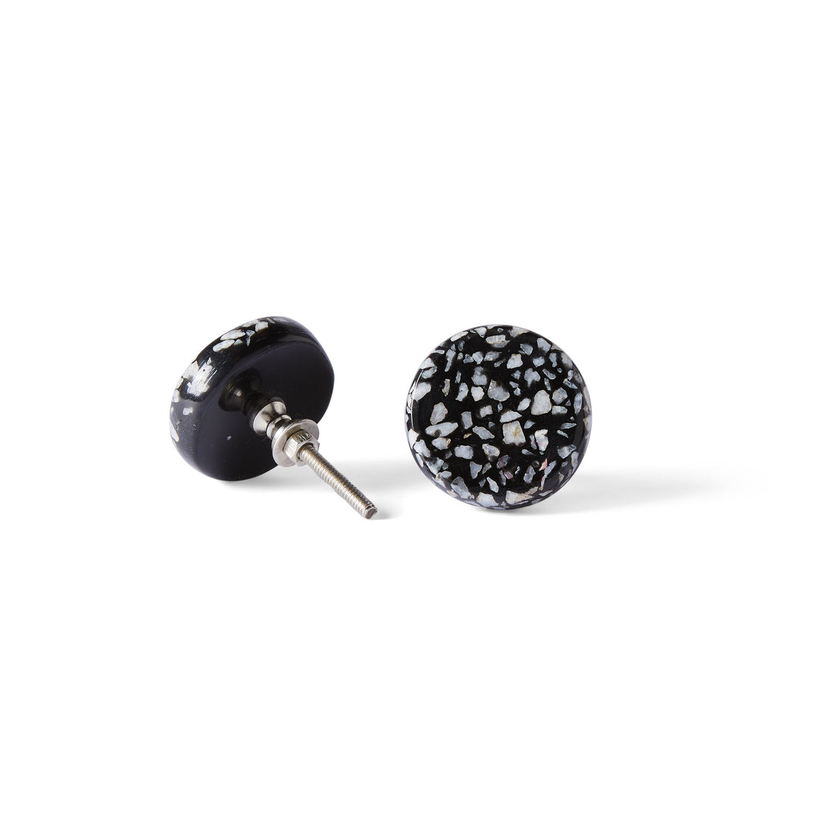 Two Speckle Black and White Knob 4.4cm earrings are shown—one flat, one upright to reveal the metal post—featuring round, black design with white speckled patterns reminiscent of terrazzo.