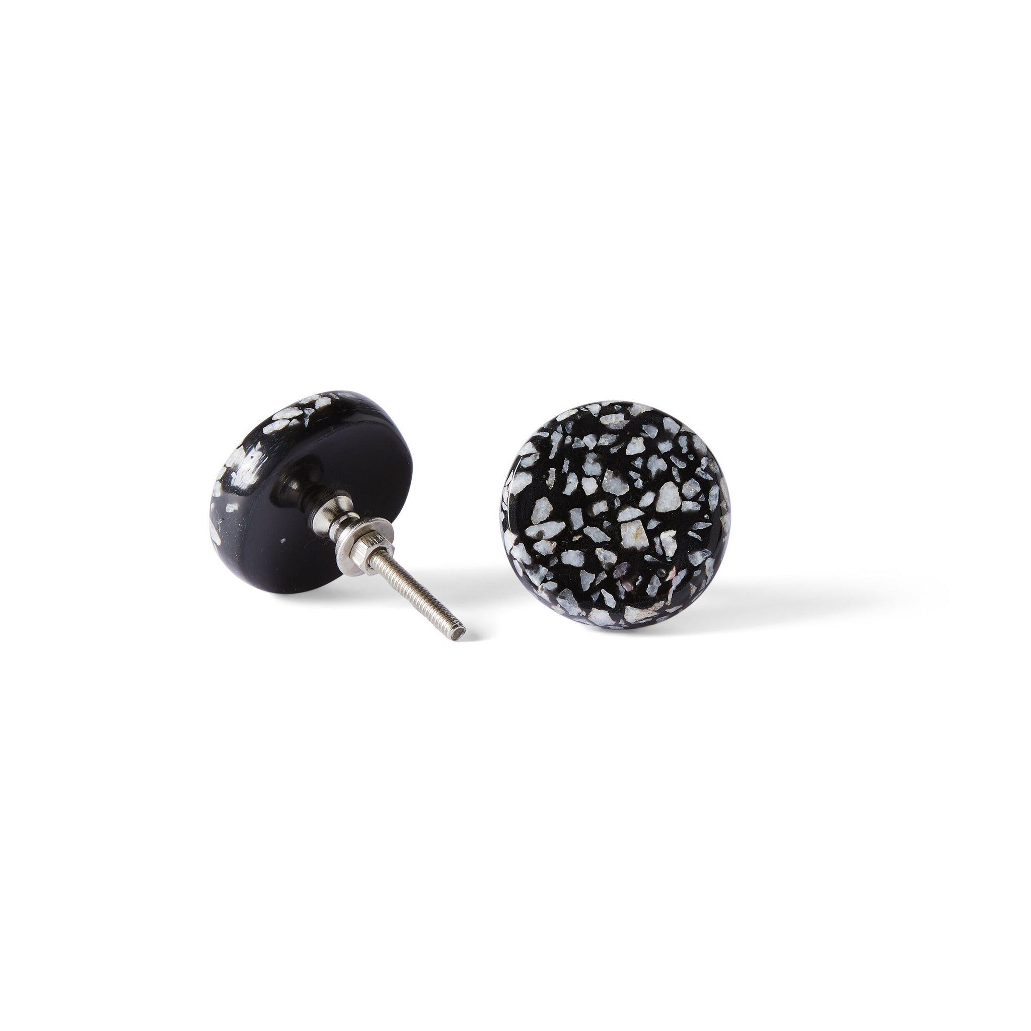 Two Speckle Black and White Knob 4.4cm earrings are shown—one flat, one upright to reveal the metal post—featuring round, black design with white speckled patterns reminiscent of terrazzo.