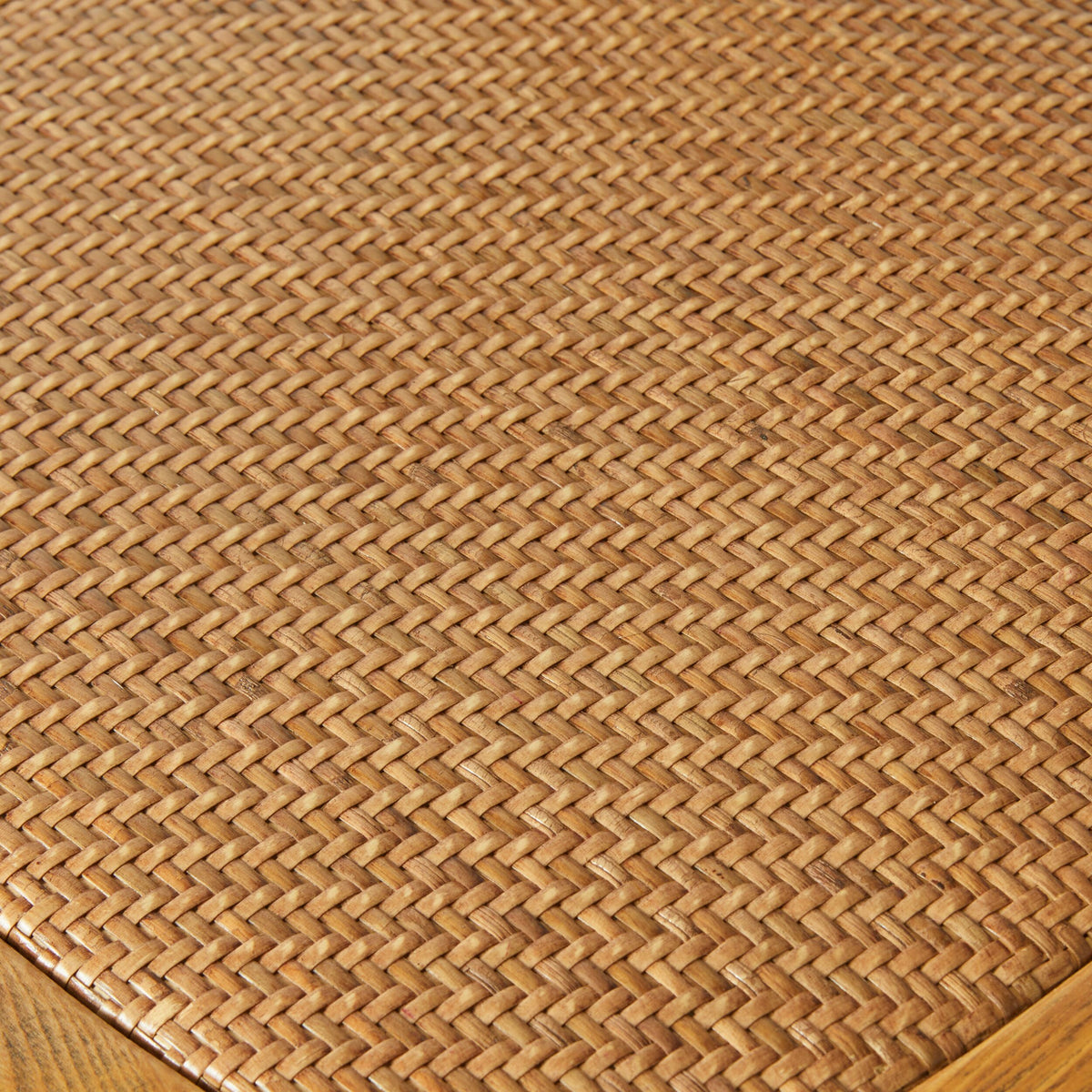 Close-up of the Provincial Cross Back Dining Chair Natural Oak, featuring a woven rattan pattern in natural light brown, as seen in classic French Provincial design and cross back chairs.