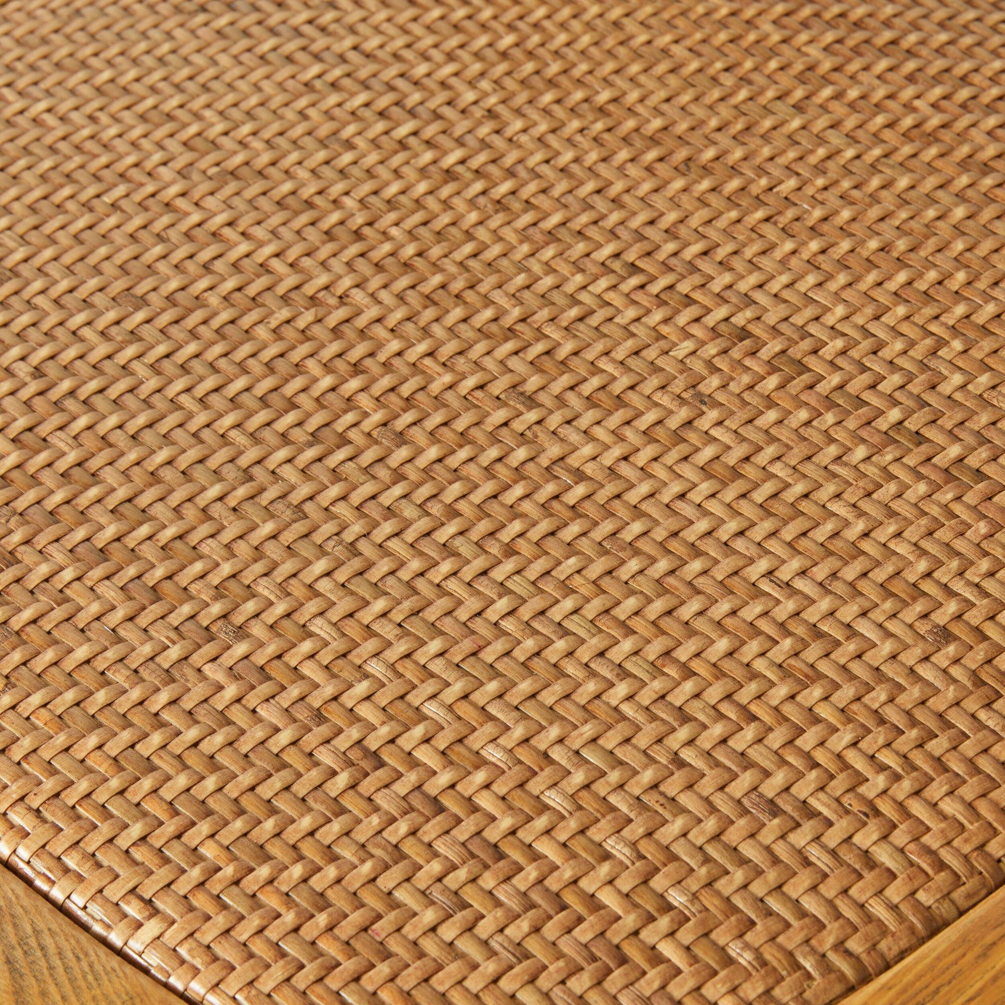 Close-up of the Provincial Cross Back Dining Chair Natural Oak, featuring a woven rattan pattern in natural light brown, as seen in classic French Provincial design and cross back chairs.