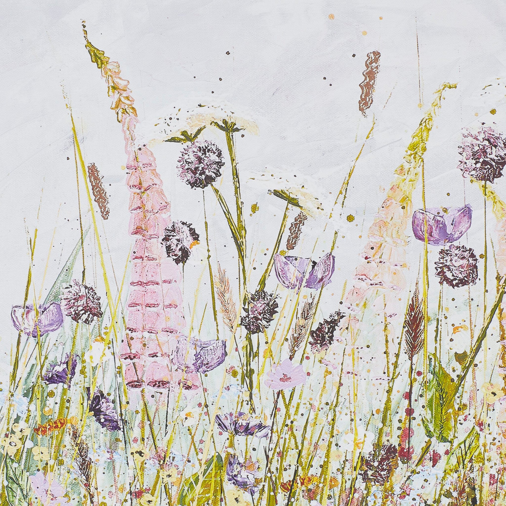 The Arthouse Foxglove Haven Framed Print (100x50cm) features wildflowers and grasses in soft pastels on a white background, with light splatters and texture—ideal for adding serenity to a modern space.
