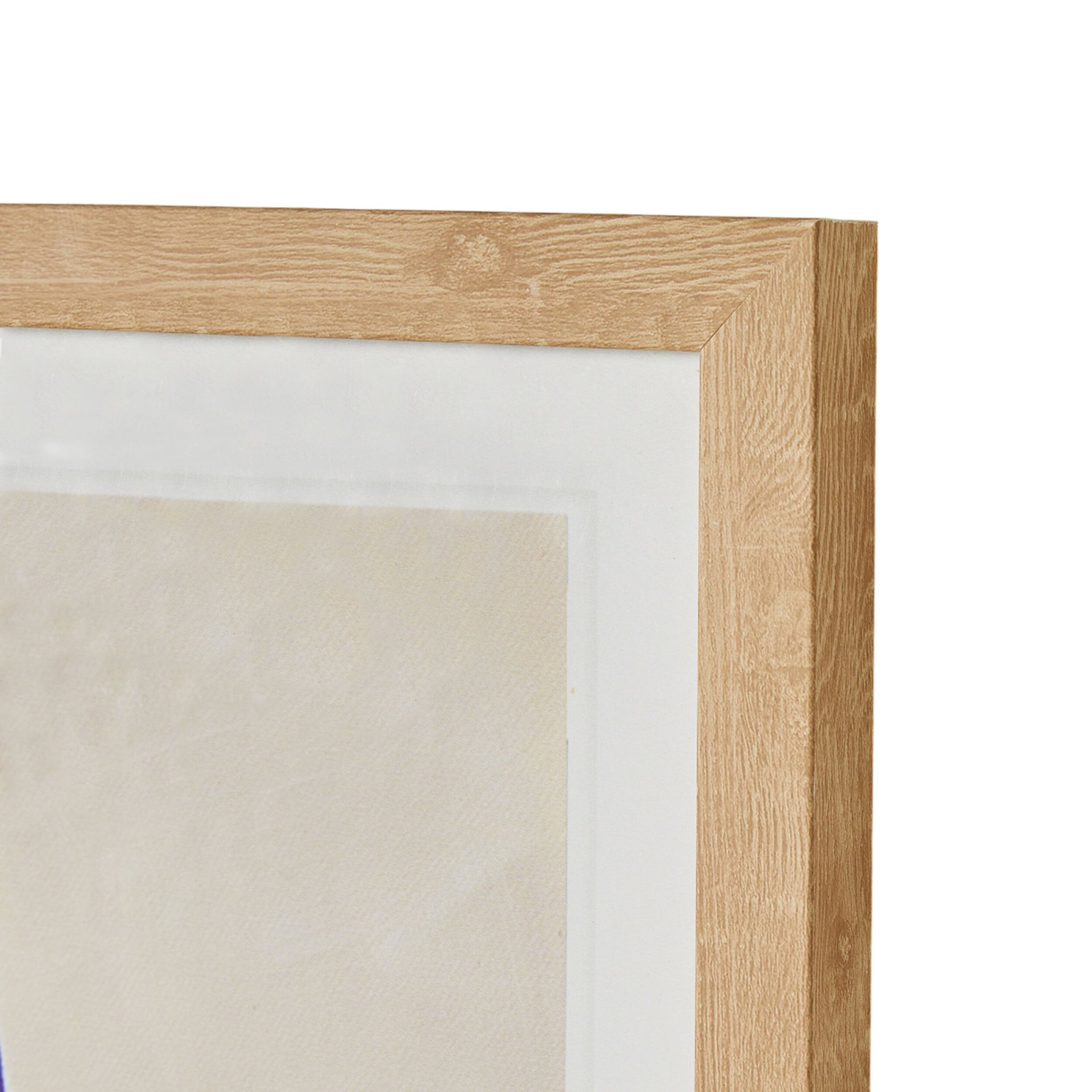 Close-up of a wooden picture frame corner displaying a beige mat with an indistinct image, potentially the Springer On Blue print inspired by Carol Dillon's art, in a 40x40cm frame.