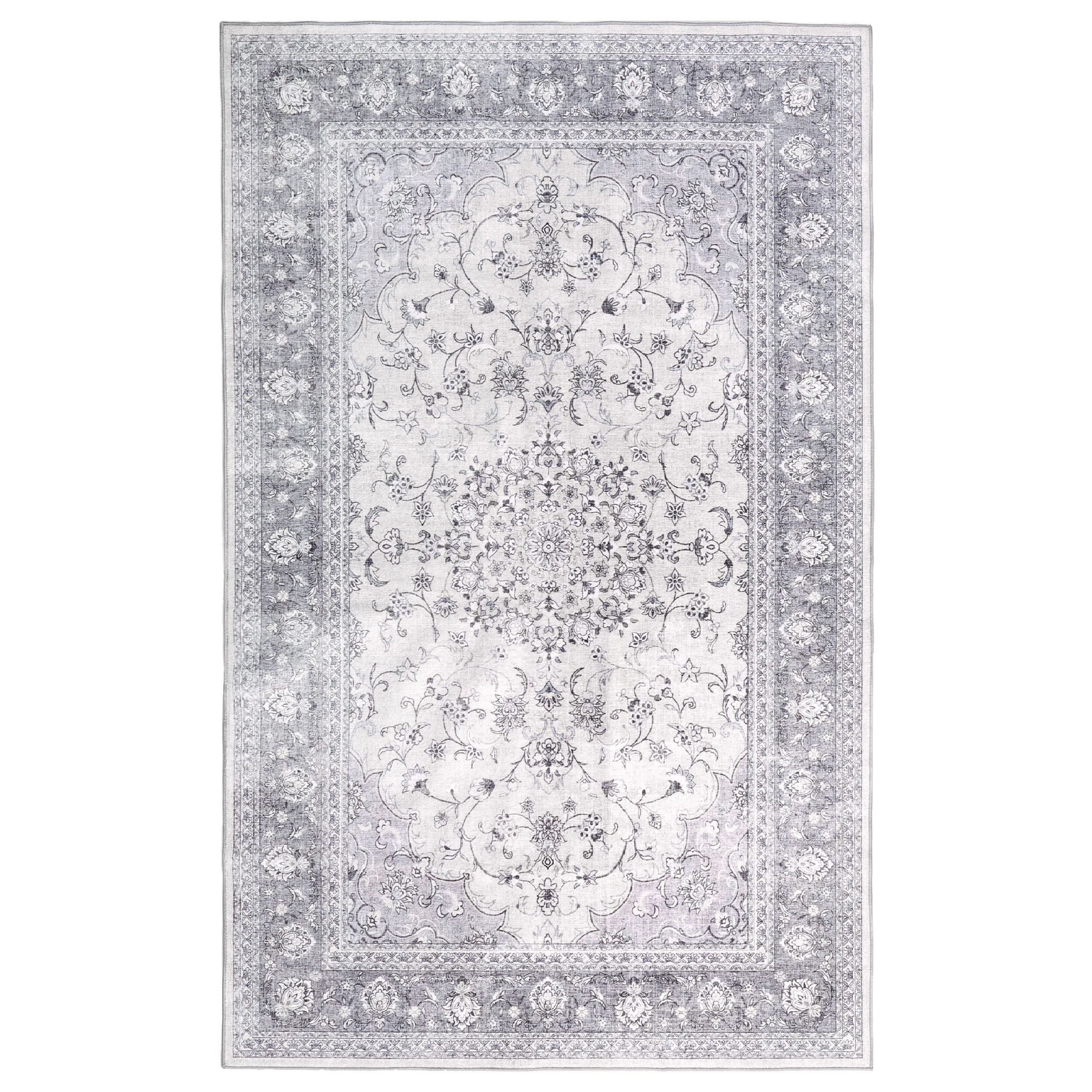The Manisa Washable Rug 240x300cm features a rectangular Persian-inspired design with a faded floral and geometric pattern in beige, cream, and blue-green. Made from durable, machine-washable polyester for easy care.