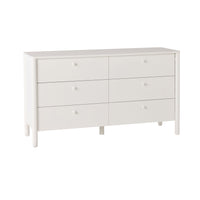 The Spintara 6 Drawer Low Chest White features a minimalist design with round handles, crafted from pine timber, six drawers, and short legs, shown against a plain white background.