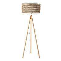 The Lexi Seagrass Natural Tripod Floor Lamp (165x45cm) features a wooden tripod base, woven rattan shade, white visible power cord and switch, inspired by coastal living style.