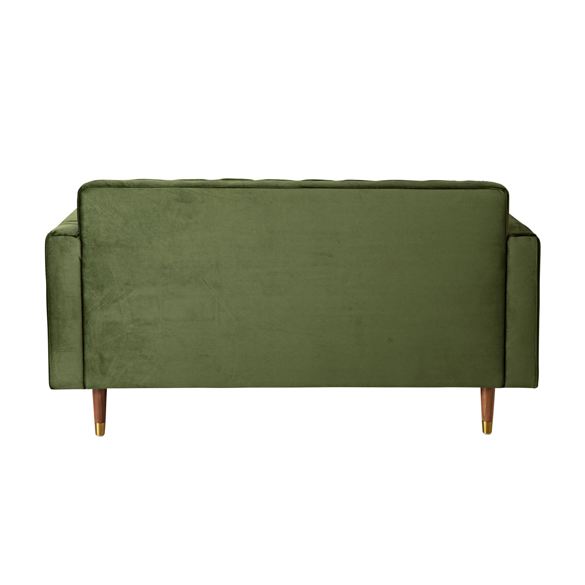 The Stitch 2 Seater Velvet Sofa in Juniper Olive is shown from the back, highlighting its green velvet upholstery and wooden legs with brass caps, set against a white background.