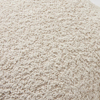 Close-up image featuring the textured fabric of the Byron Boucle Cushion in Oatmeal, highlighting its boucle pattern.