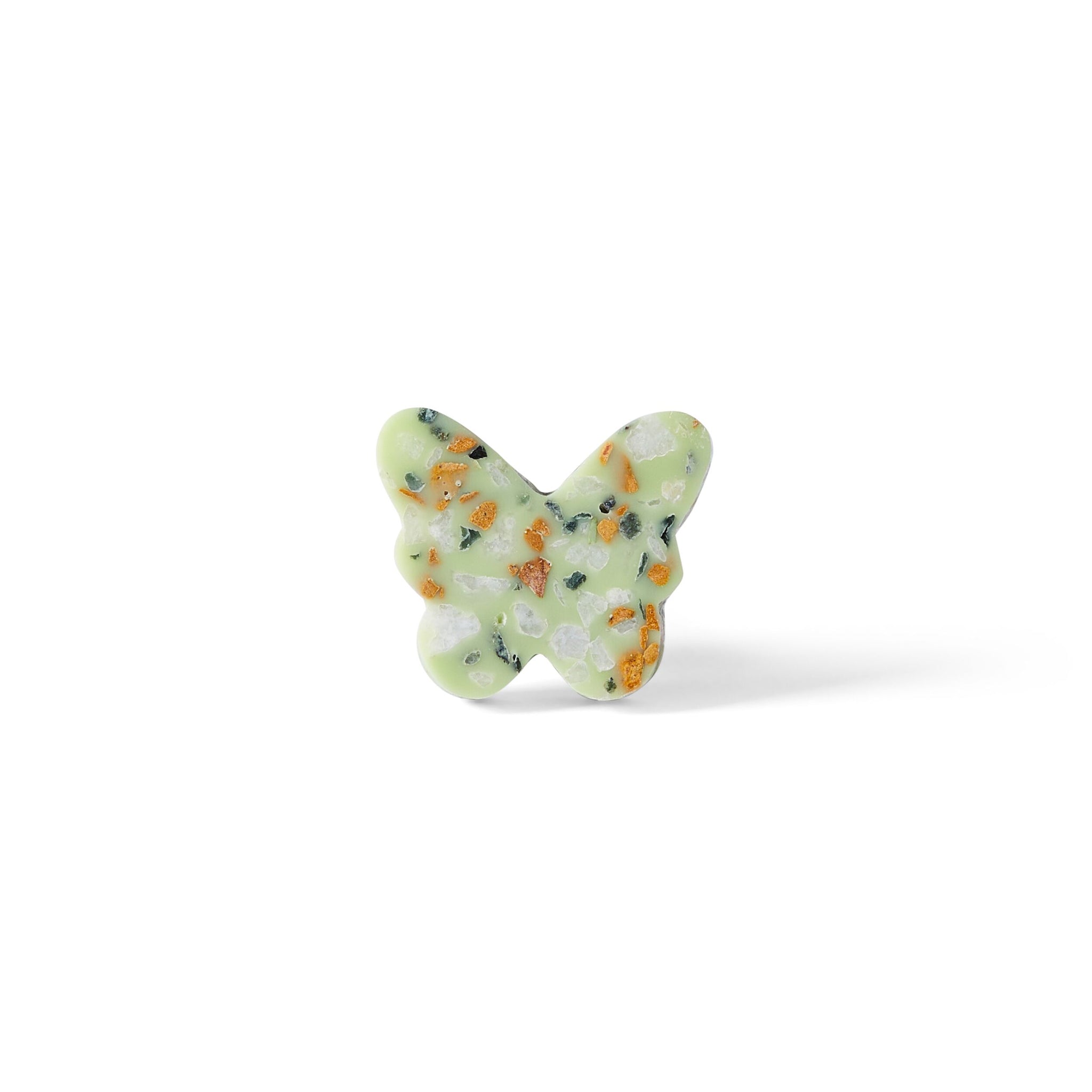 The Speckle Green Butterfly Knob 3.7cm features a butterfly shape with a light green base and multicolored speckles—an ideal decorative drawer pull for any space. Displayed against a white background.