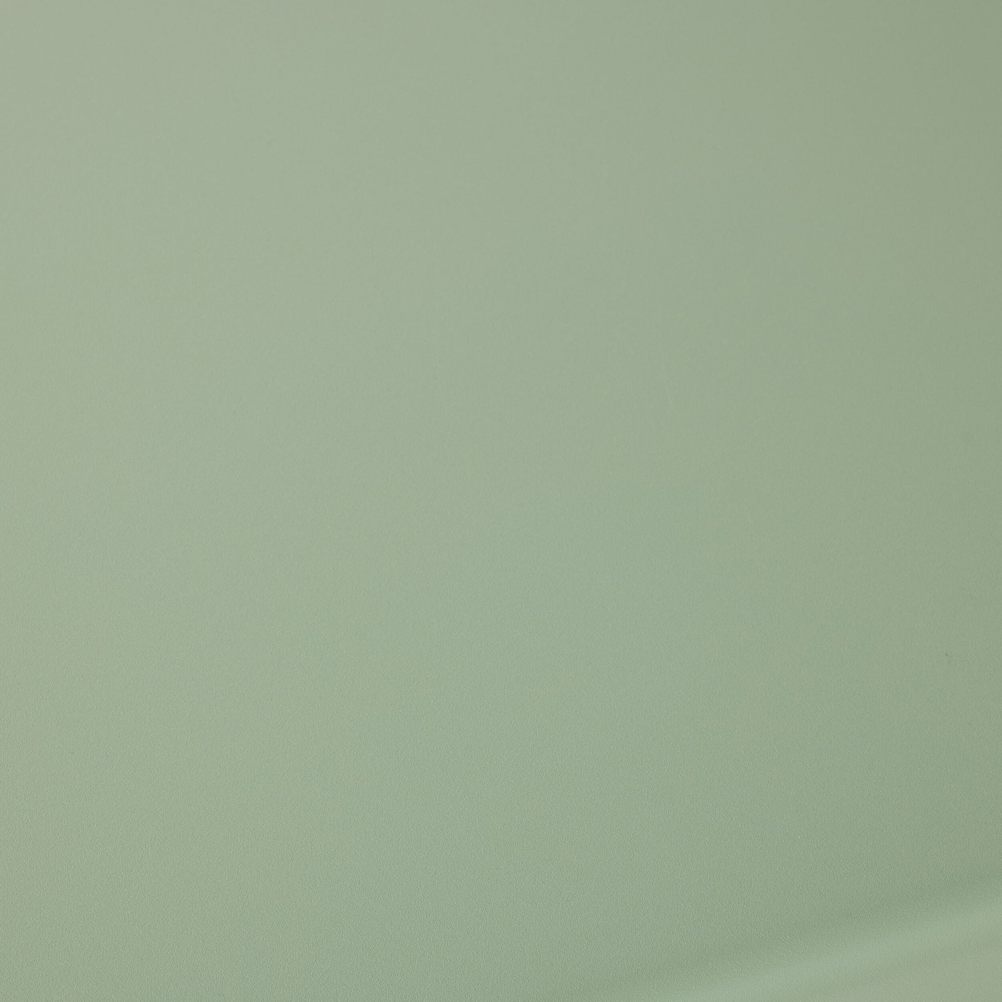 The Cambell Aluminium Table in Native Green features a smooth, light powder-coated surface with a subtle texture.