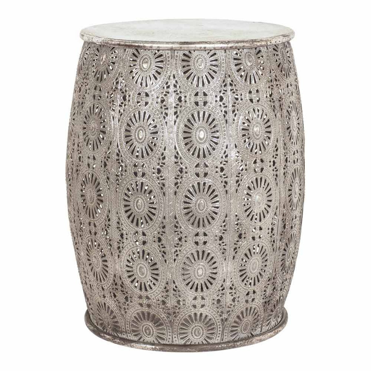 The Surat Metal Stool (34.5x34.5x41.5cm) is a polished antique silver drum-shaped stool adorned with circular floral patterns.