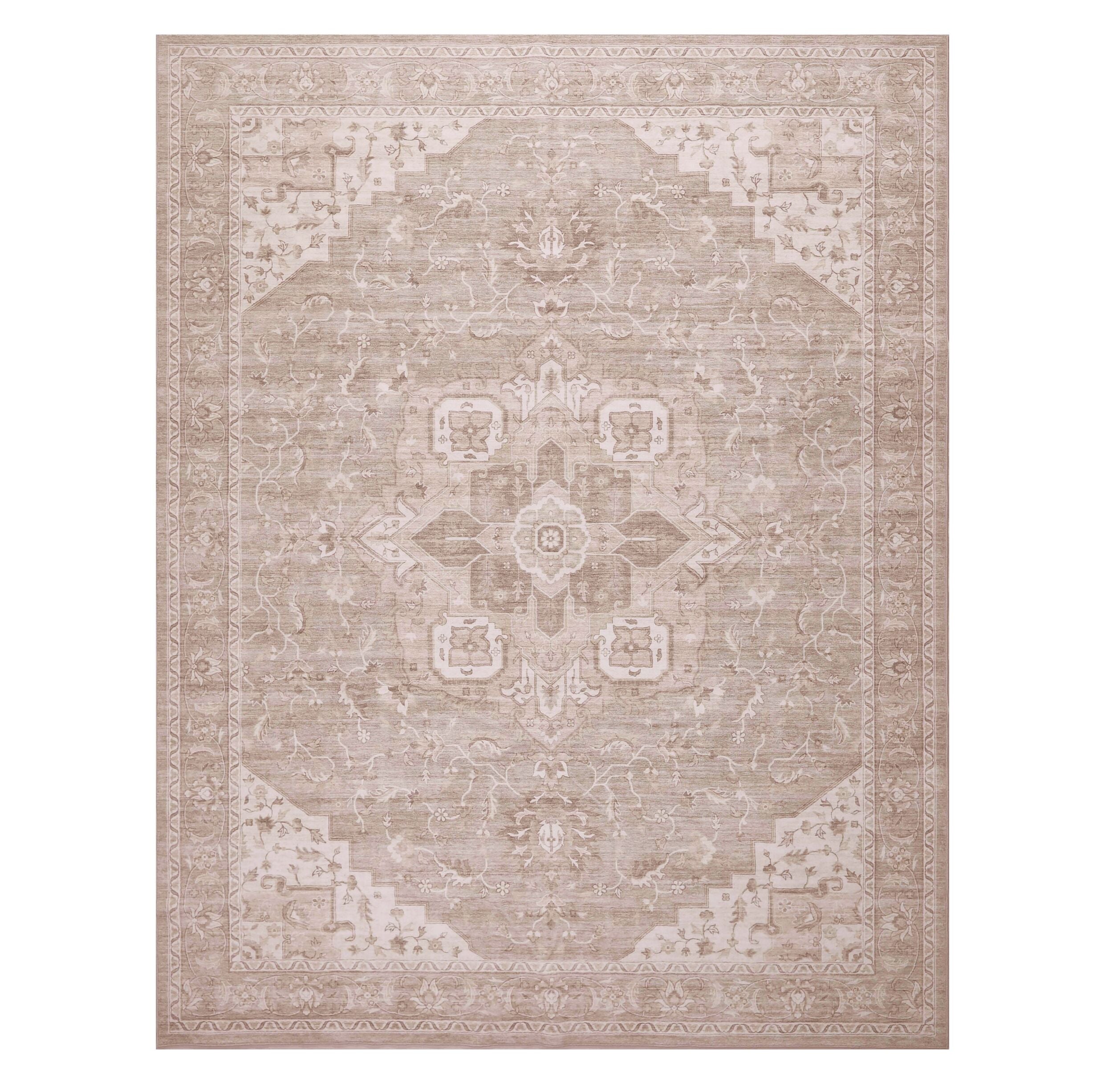 The Manisa Washable Rug 240x300cm features a rectangular Persian-inspired design with a faded floral and geometric pattern in beige, cream, and blue-green. Made from durable, machine-washable polyester for easy care.