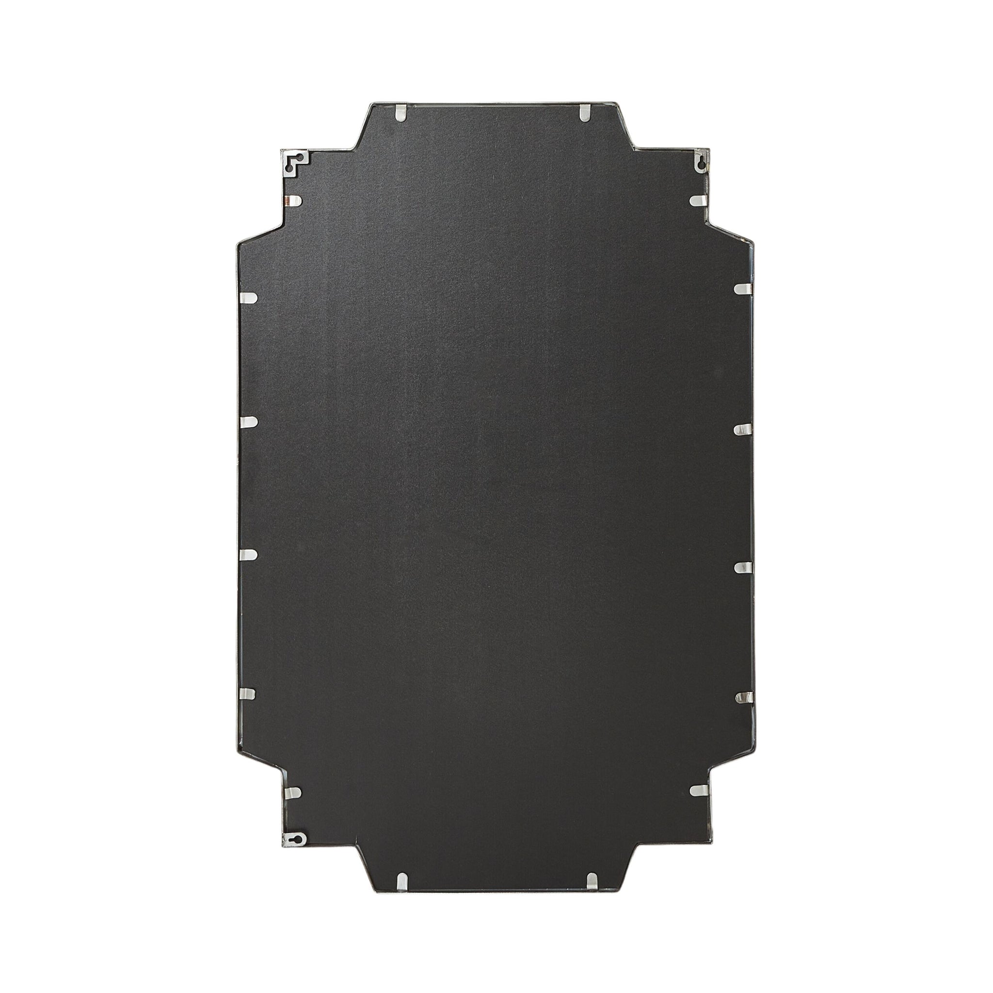 The Dominique Emerald Mirror Silver 90x60cm features a flat, rectangular black panel with notched edges and small metal fasteners along the perimeter, making it a Deco-inspired statement piece against a white background.