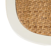 Close-up of the Provincial Cross Back Dining Chair Vintage White seat, showcasing woven rattan in a herringbone pattern and a vintage white wooden frame.