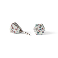 A set of two Speckle Geo Knob 3.8cm cabinet knobs with a white base, multicolored speckles, and metal screw fittings—ideal for adding a stylish hexagonal accent to your space.