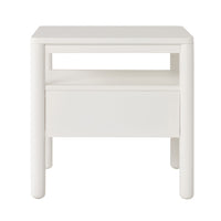 The Spintara 1 Drawer Bedside Table White features rounded edges, an open shelf, and a single drawer—photographed against a plain white background, it's ideal for bringing coastal country style to your room.
