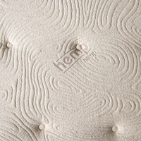 A close-up reveals a textured mattress cover with stitched patterns and "hemp" beautifully embroidered. Beneath lies the Annie Premium Mattress Double, featuring a supportive 5-zone pocket spring system for ultimate comfort.