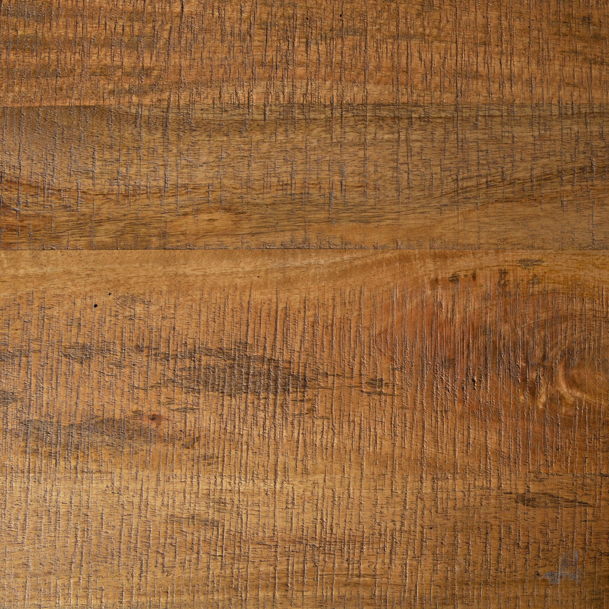 The Fulham Large Ladder Shelving Unit showcases a close-up of textured mango wood with visible grain, presenting various brown shades that add a contemporary touch.