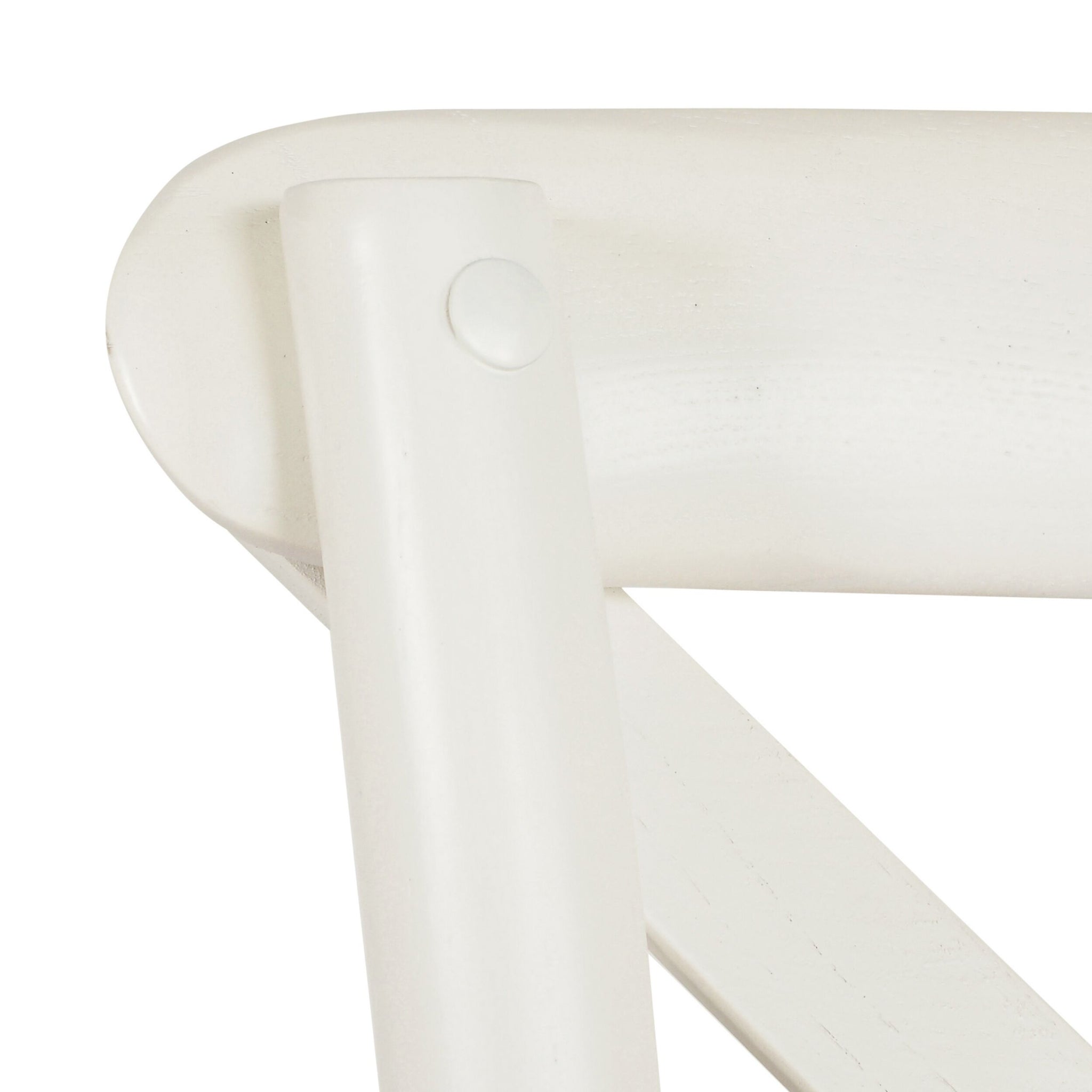 Close-up of the Provincial Cross Back Dining Chair in Vintage White, highlighting the top corner with its rounded support post and part of the cross backrest slat.