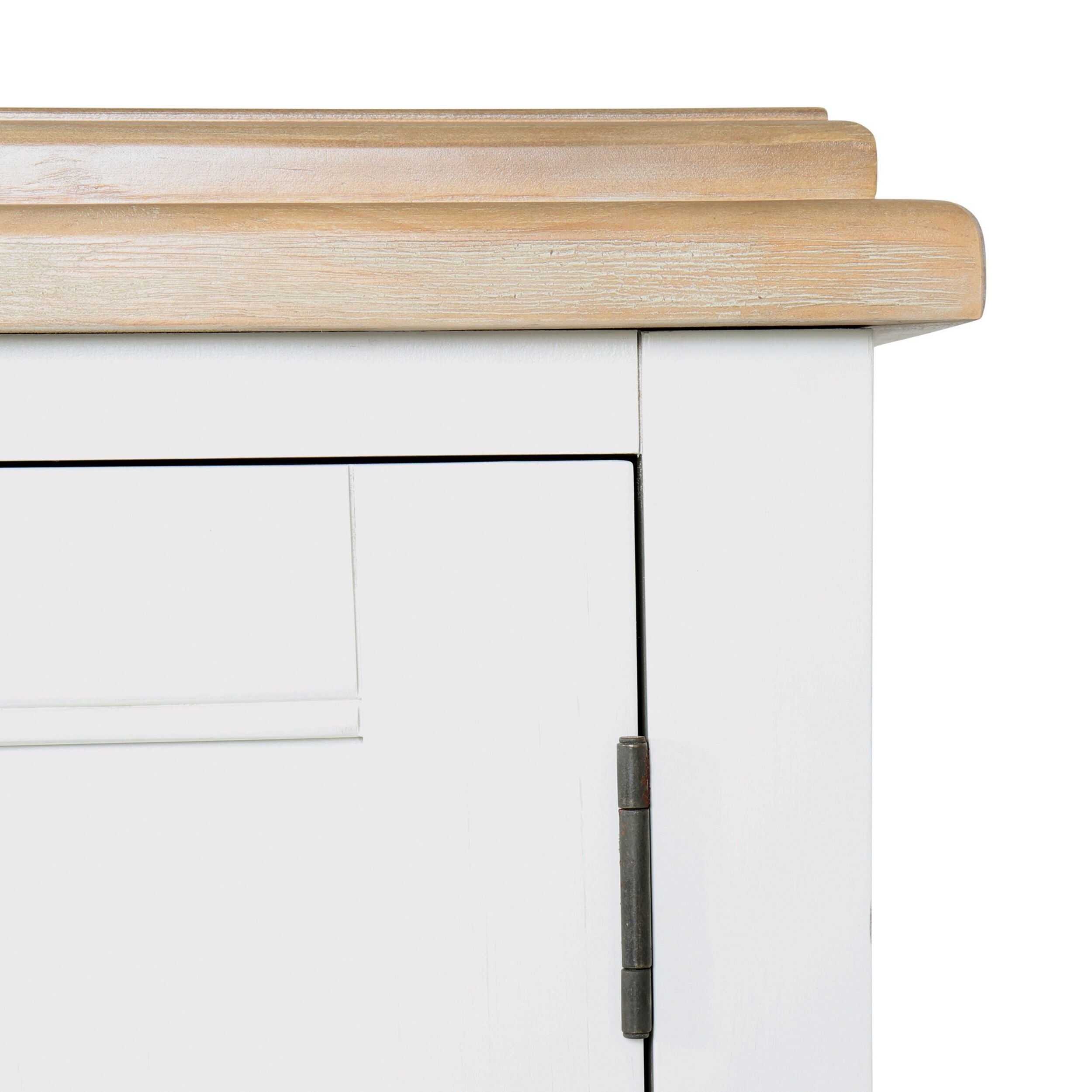 Close-up of a Clover Large Sideboard corner, featuring a wooden top and visible hinge on the door, showcasing elements of timber furniture design.