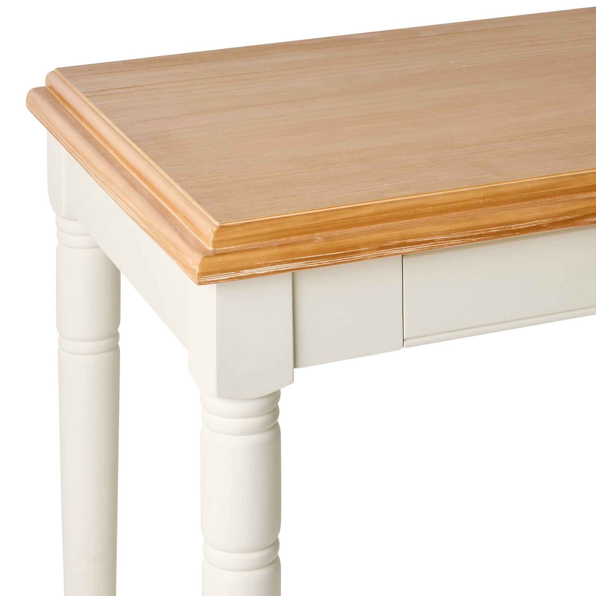 Isolated view of vanity desk with white legs and wooden top, two drawers with knobs.