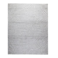 The Tufted Teal Jules Rug 300x240cm features a subtle geometric pattern of curved and straight lines, bringing understated Mid-Century style to any space.