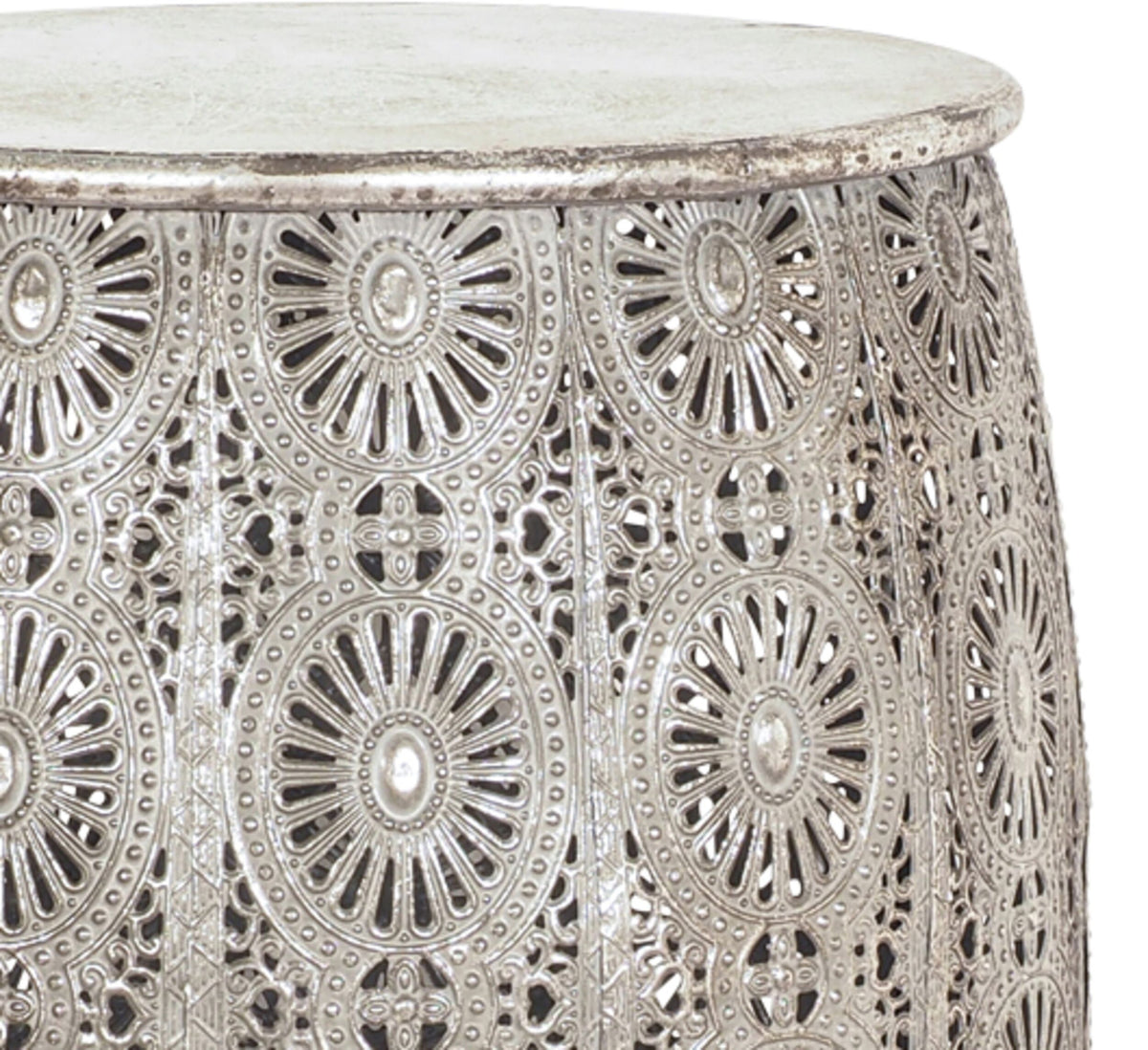 A close-up of the Surat Metal Stool (34.5x34.5x41.5cm) highlights its intricate circular pattern and polished antique silver finish, exuding elegant charm.