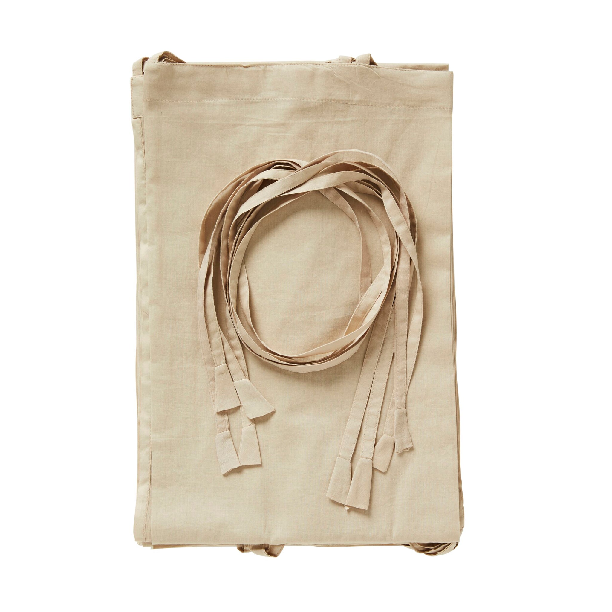 The Hampton Cotton Voile Curtain set of 6 in beige features folded fabric with long straps, evoking the look of neutral canopy bed curtains ideal for a Hampton-style bedroom.