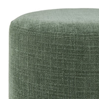 Close-up of the Edie Round Ottoman Solace Moss, showcasing durable textured polyester fabric in green, a rounded top, visible seam stitching, and versatile functionality.