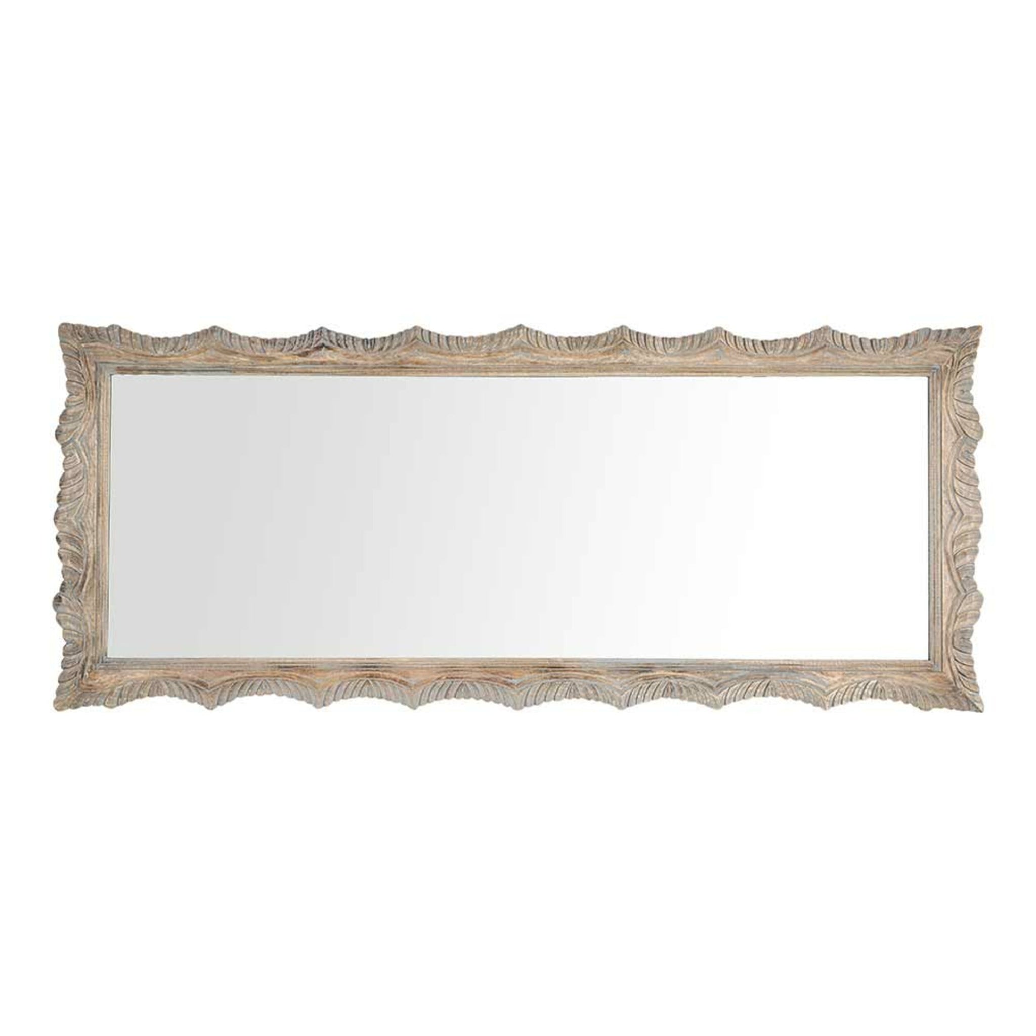 The Frieze Scalloped Edge Hand Carved Mirror, measuring 90x215cm, has a rectangular shape featuring a hand-carved wooden frame with wavy, scalloped edges.