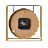 Back view of the Caged Mantel Clock Gold 18x18x7cm, showing its round metal frame along with the exposed battery compartment and clock mechanism.